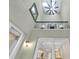 Two-story interior with open floor plan and balcony at 3817 W Dale Ave # 2, Tampa, FL 33609