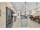 Modern kitchen with stainless steel appliances and light cabinets at 3817 W Dale Ave # 2, Tampa, FL 33609