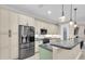 Stylish kitchen featuring stainless steel appliances and granite counters at 3817 W Dale Ave # 2, Tampa, FL 33609