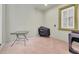 Outdoor lanai with tiled floor, grill, and pet area at 3817 W Dale Ave # 2, Tampa, FL 33609