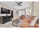 Comfortable living room with leather seating and a flat-screen TV at 3817 W Dale Ave # 2, Tampa, FL 33609