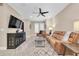 Relaxing living room, featuring leather couches and a large TV at 3817 W Dale Ave # 2, Tampa, FL 33609