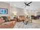 Open living area with leather furniture and adjacent dining area at 3817 W Dale Ave # 2, Tampa, FL 33609