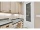 Kitchen pantry with built-in workspace and cabinetry at 3817 W Dale Ave # 2, Tampa, FL 33609