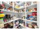 Well-organized pantry with ample shelving for storage at 3817 W Dale Ave # 2, Tampa, FL 33609
