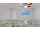 Bright living room with large window and hardwood floors at 4221 58Th N Ave, St Petersburg, FL 33714