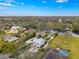 Wide aerial view of home and surrounding area at 5906 N Kenneth Ave, Tampa, FL 33604