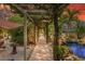 Pathway to pool area with stone and plants at 5906 N Kenneth Ave, Tampa, FL 33604