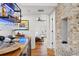 Home bar with wooden countertop and shelving at 5906 N Kenneth Ave, Tampa, FL 33604