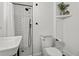 Updated bathroom with subway tile shower and modern vanity at 5906 N Kenneth Ave, Tampa, FL 33604