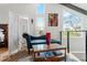 Spacious bedroom with a room divider and large windows at 5906 N Kenneth Ave, Tampa, FL 33604