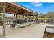 Covered boat lift on a private dock at 5906 N Kenneth Ave, Tampa, FL 33604