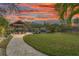 Private dock with covered seating area, perfect for enjoying waterfront views at 5906 N Kenneth Ave, Tampa, FL 33604
