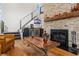 Stylish stone fireplace with a built-in bar area at 5906 N Kenneth Ave, Tampa, FL 33604
