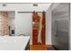 Unique kitchen featuring a live-edge wood barn door at 5906 N Kenneth Ave, Tampa, FL 33604