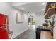Modern galley kitchen with retro refrigerator and wood countertops at 5906 N Kenneth Ave, Tampa, FL 33604