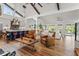 Open floor plan with spacious kitchen, island, and hardwood floors at 5906 N Kenneth Ave, Tampa, FL 33604