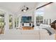 Relaxing living room featuring a large TV and comfortable seating at 5906 N Kenneth Ave, Tampa, FL 33604