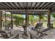 Relaxing patio with seating and pond feature at 5906 N Kenneth Ave, Tampa, FL 33604