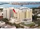 Aerial view of a high-rise building with city and water views at 628 Cleveland St # 1201, Clearwater, FL 33755