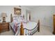 Bedroom with a double bed and wood furniture at 628 Cleveland St # 1201, Clearwater, FL 33755