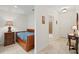 Small bedroom with a daybed and en-suite bathroom access at 628 Cleveland St # 1201, Clearwater, FL 33755