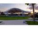 Modern park pavilion with stage and surrounding green space at 628 Cleveland St # 1201, Clearwater, FL 33755