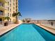Inviting rooftop pool with lounge chairs and a pergola at 628 Cleveland St # 1201, Clearwater, FL 33755
