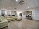 Relaxing recreation area with a pool table, seating, and game tables at 628 Cleveland St # 1201, Clearwater, FL 33755