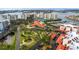 Aerial view of condo complex, pool, and marina at 7893 Sailboat Key S Blvd # 304, South Pasadena, FL 33707