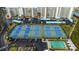 Aerial view of tennis and shuffleboard courts at 7893 Sailboat Key S Blvd # 304, South Pasadena, FL 33707
