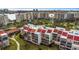 Condo building with water access; aerial view at 7893 Sailboat Key S Blvd # 304, South Pasadena, FL 33707
