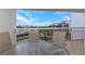 Balcony with seating and water views at 7893 Sailboat Key S Blvd # 304, South Pasadena, FL 33707