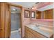 Bathroom with vanity, sink, and shower at 7893 Sailboat Key S Blvd # 304, South Pasadena, FL 33707