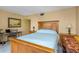 Bedroom with a workspace and water views at 7893 Sailboat Key S Blvd # 304, South Pasadena, FL 33707