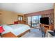 Main bedroom with water views and balcony access at 7893 Sailboat Key S Blvd # 304, South Pasadena, FL 33707