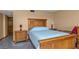 Guest bedroom with wood furniture at 7893 Sailboat Key S Blvd # 304, South Pasadena, FL 33707