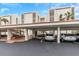 Condo building exterior with covered parking at 7893 Sailboat Key S Blvd # 304, South Pasadena, FL 33707