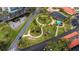 Landscaped grounds with walking paths; aerial view at 7893 Sailboat Key S Blvd # 304, South Pasadena, FL 33707