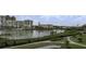 Scenic waterfront view of canal and buildings at 7893 Sailboat Key S Blvd # 304, South Pasadena, FL 33707