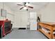 Laundry room with washer, dryer, workbench, and ample storage at 8086 Annwood Rd, Seminole, FL 33777