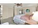 Main bedroom with a post bed, and sliding door access to a private patio at 8086 Annwood Rd, Seminole, FL 33777