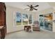 Relaxing sunroom with comfy seating and access to the backyard at 8086 Annwood Rd, Seminole, FL 33777