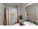 Clean bathroom with granite countertop and shower at 10251 Carloway Hills Dr, Wimauma, FL 33598