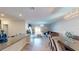 Open concept dining area with a view of the kitchen and living room at 10251 Carloway Hills Dr, Wimauma, FL 33598