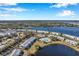 Aerial view showing community, waterfront, and boat access at 107 Seahorse Se Dr # A, St Petersburg, FL 33705