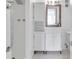 Clean bathroom with a shower, vanity, and mirror at 107 Seahorse Se Dr # A, St Petersburg, FL 33705