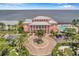 Grand community center with circular driveway and waterfront views at 107 Seahorse Se Dr # A, St Petersburg, FL 33705