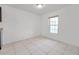 Simple dining area with tile floors and a large window at 107 Seahorse Se Dr # A, St Petersburg, FL 33705