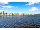 Calm lake view with waterfront homes and lush landscaping at 107 Seahorse Se Dr # A, St Petersburg, FL 33705